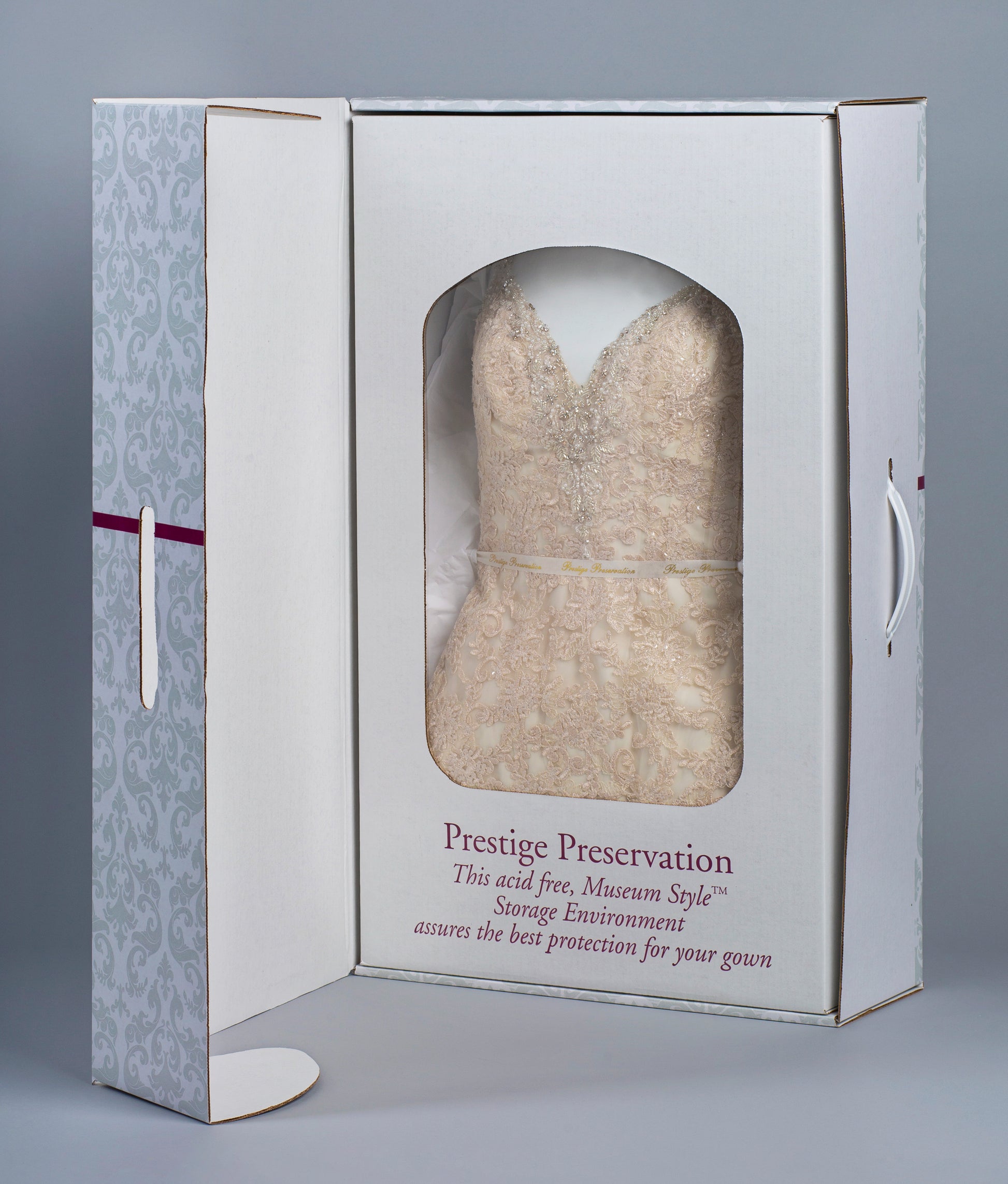 boxed dress in casing. Wedding Dress preservation | preserved wedding dress | happilyeverafterpreservation.com